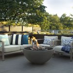 Planters on ledge and behind chairs